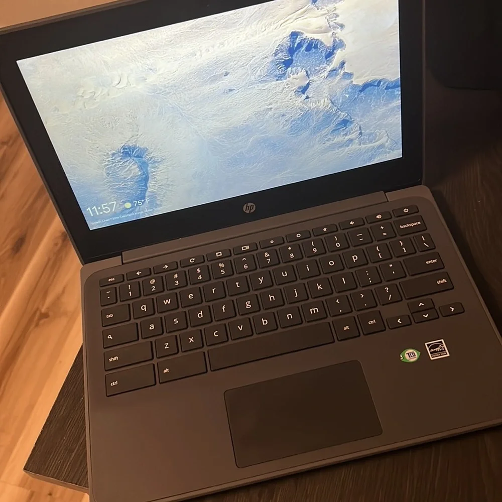 HP 11.6’ Chromebook, black, in great condition barely used, with charging cable.